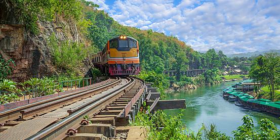 trains,running,on,death,railways,track,crossing,kwai,river,in