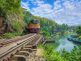 trains,running,on,death,railways,track,crossing,kwai,river,in