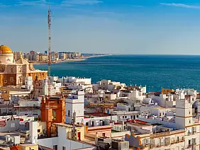 aerial,panoramic,view,of,the,old,city,rooftops,and,cathedral