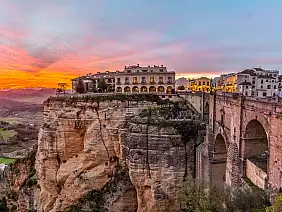 a,spectacular,sunset,with,the,new,bridge,over,the,el