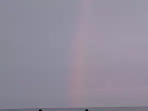 arcobaleno sulla spiaggia