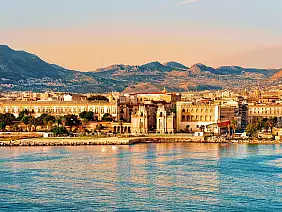 sunrise at the mediterranian sea and palermo old city, sicily island in italy