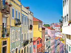 colorful buildings of lisbon historic center near landmark rossio square