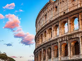 colosseum at sunset in rome, italy
