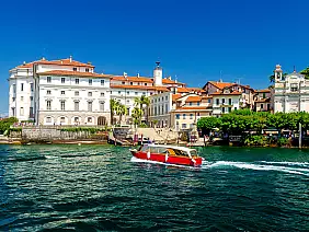 beautiful port of isola bella island with baroque borromean palace situated within lake...