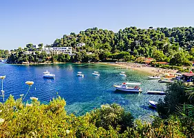turistipercaso Troulos beach, Skiathos island, Greece. Beautiful vivid panorama view of blue aegean sea...