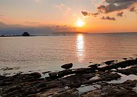 turistipercaso TRAMONTO_DA_TORRE_LIGNY_CON_VISTA_SULLE_ISOLE_EGADI