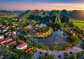 turistipercaso Aerial view of Tam coc at sunrise in Vietnam.