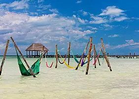 turistipercaso Hammocks in the water at Punta Cocos, Isla Holbox, Mexico