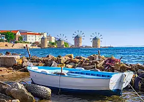 turistipercaso Old windmills by the beach, Chios island, Greece.