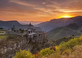 turistipercaso The ancient monastery in the setting sun. Tatev. Armenia.