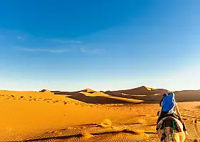 turistipercaso View of dunes in the dessert of Morocco by M'hamid