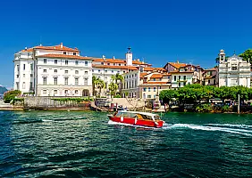 turistipercaso Beautiful port of Isola Bella island with baroque Borromean palace situated within Lake...
